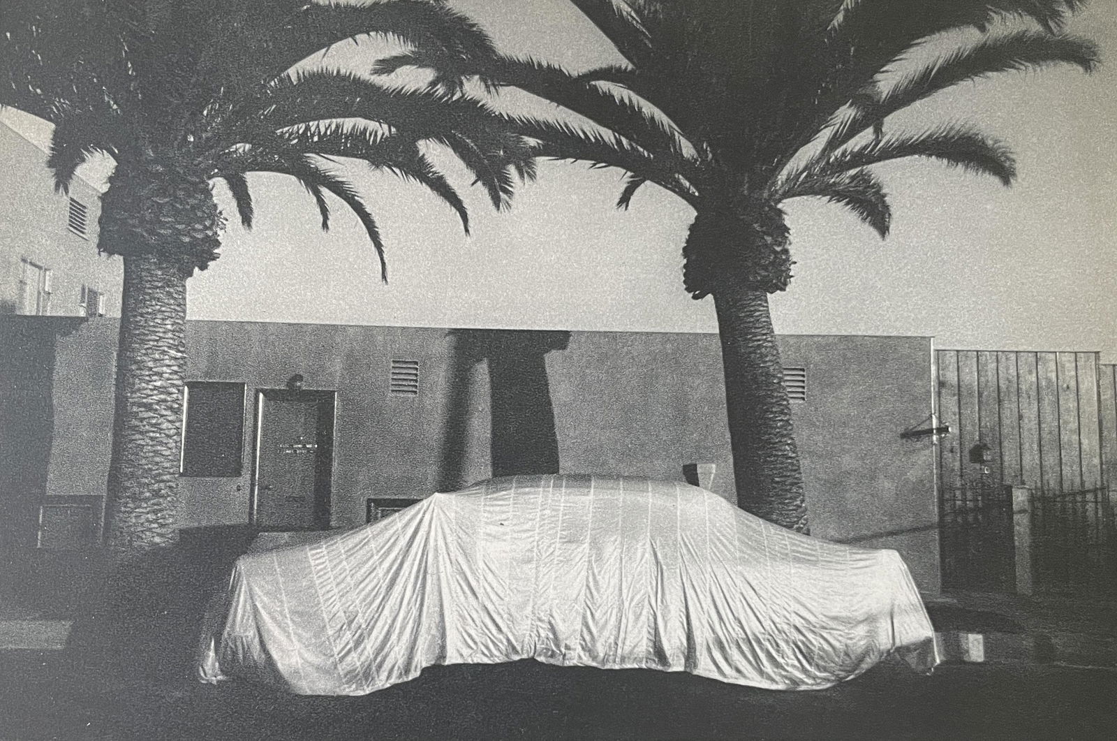 Robert Frank “Covered Car, Long Beach, California? Print: Robert Frank “Covered Car, Long Beach, California” Print Measures (approx): 5.25 x 8. Mounted to archival quality paper. Verso is blank. Printed circa 1950’s.