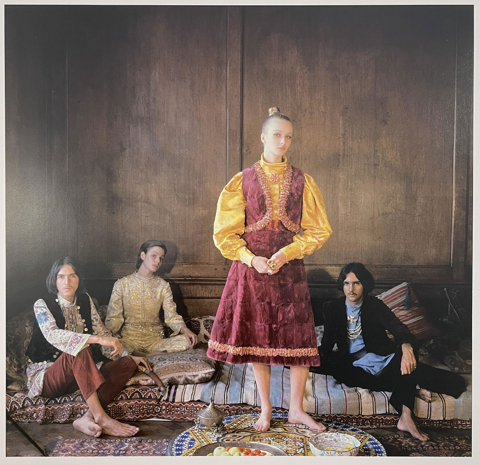 Cecil Beaton - Maudie James, 1968: CECIL BEATON (1904-1980) Maudie James and the Myers Twins, Christopher Gibbs, London, 1968 Print in Colors 10 1/4" x 10" Mounted to Archival Quality Paper. Verso is blank