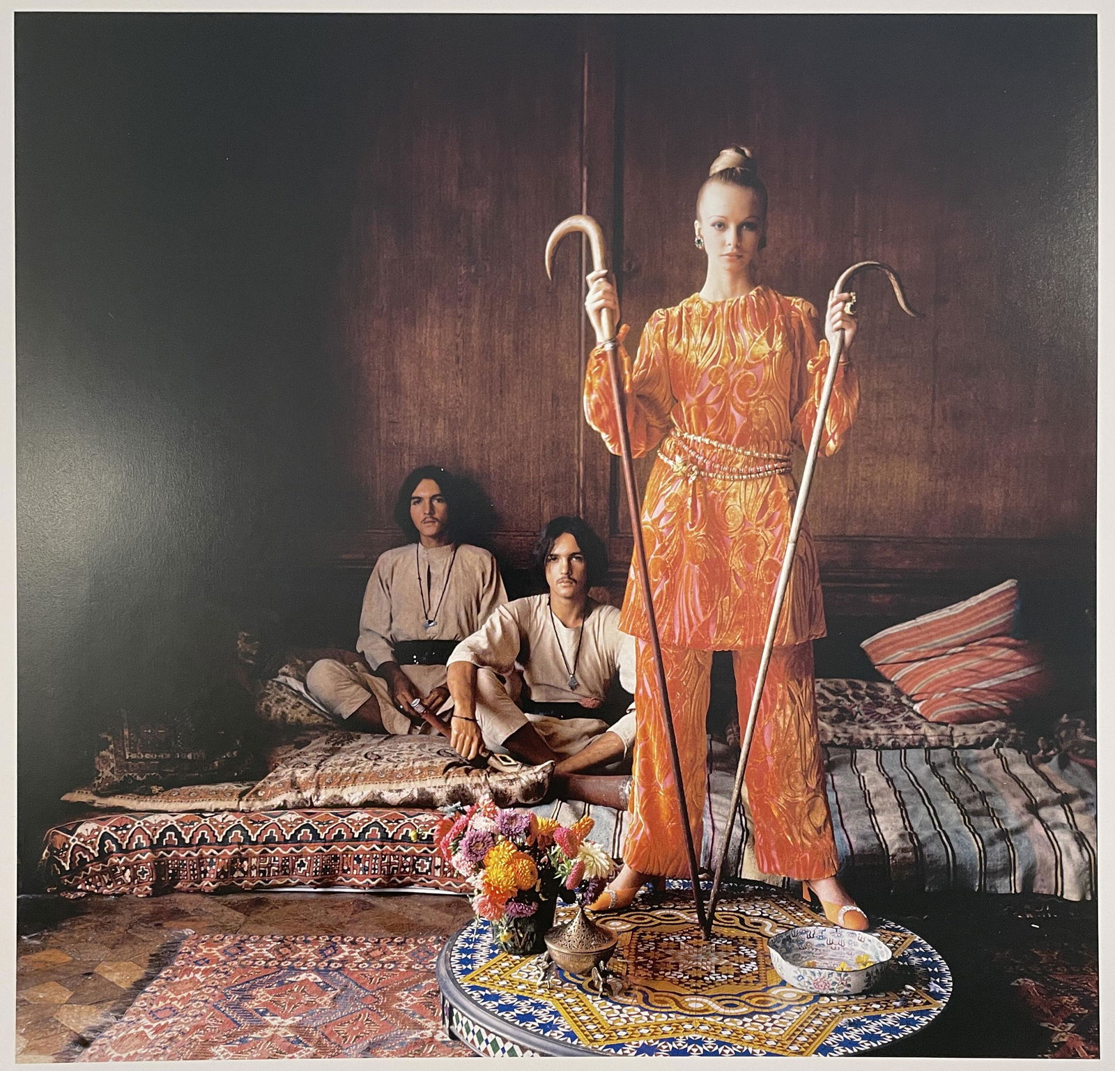 Cecil Beaton - Maudie James, 1968: CECIL BEATON (1904-1980) Maudie James and the Myers Twins, Christopher Gibbs, London, 1968 Print in Colors 10 1/4" x 10" Mounted to Archival Quality Paper. Verso is blank