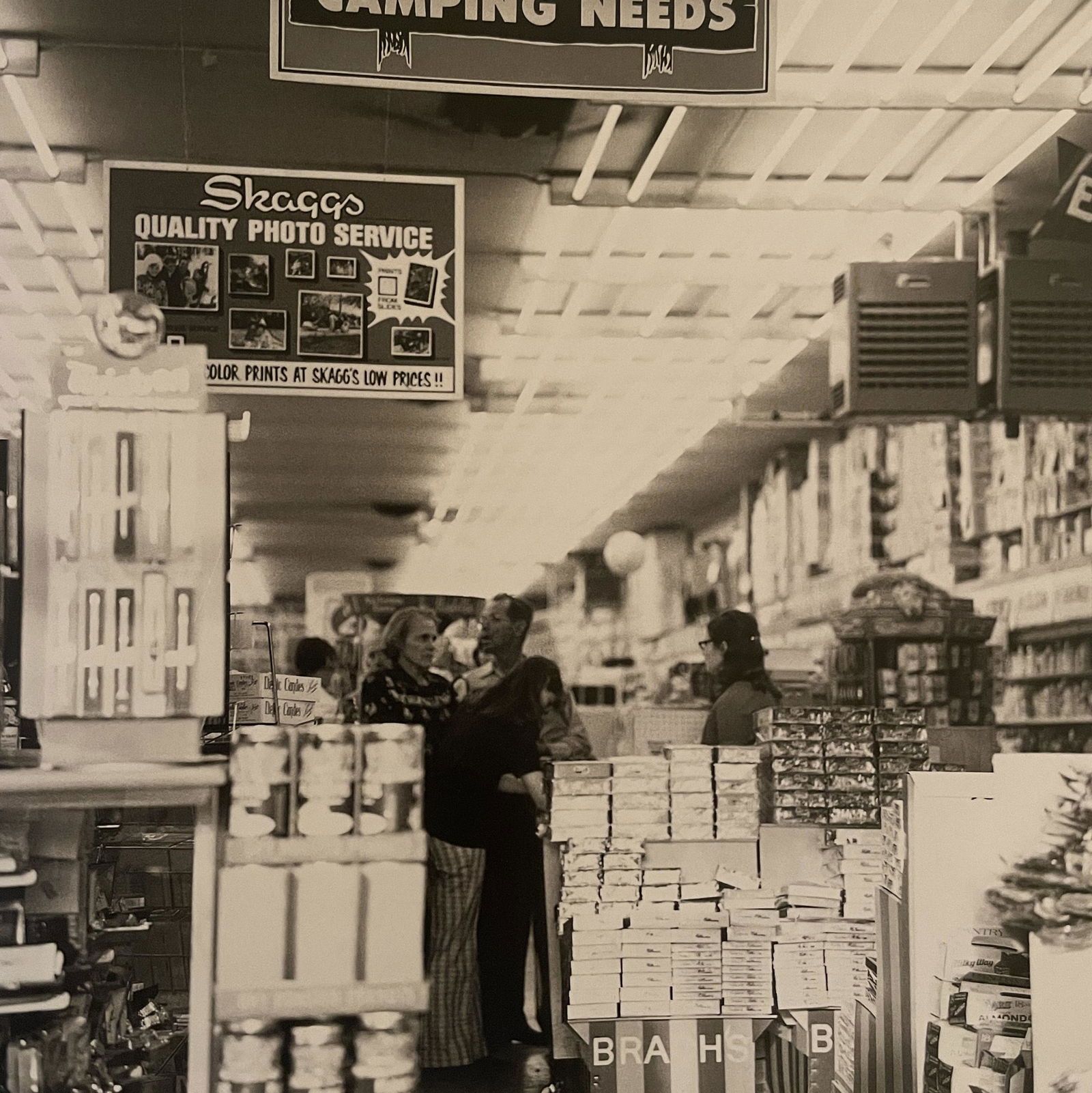 Robert Adams "Drogeriermarkt, Lakeside" Print: Robert Adams "Drogeriermarkt, Lakeside" Print. Measures 6 x 6. Mounted to Archival Quality Paper. Verso is blank. Printed circa 1970's.