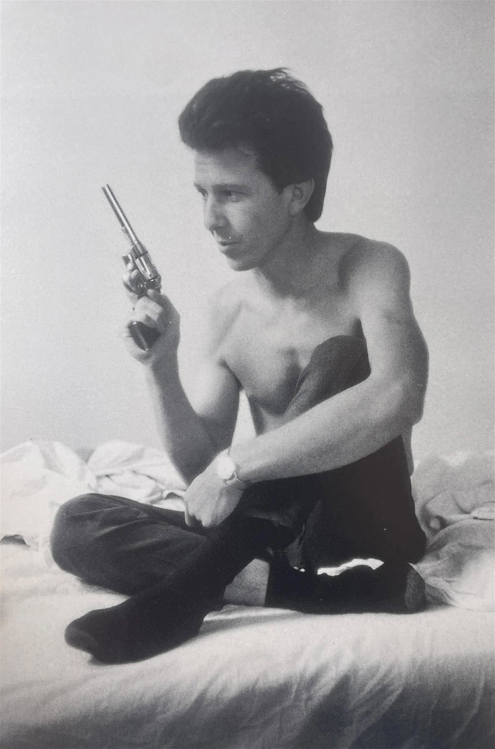 Larry Clark "Revolver" Print: Larry Clark "Revolver" Print. Measures 8 x 5.25. Mounted to Archival Quality Paper. Verso is blank. Printed circa 1970's.