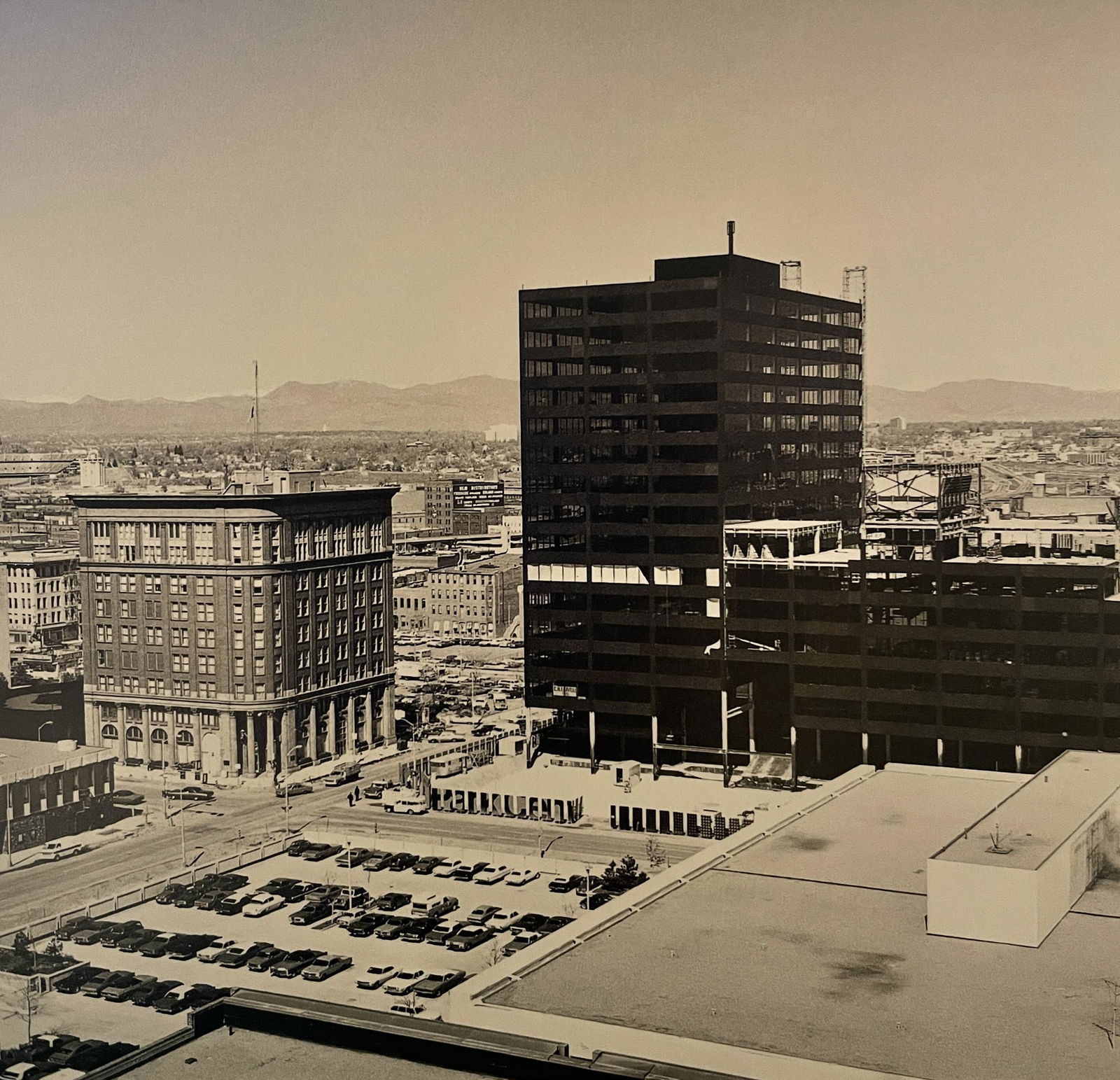Robert Adams "15th Street, Denver" Print: Robert Adams "15th Street, Denver" Print. Measures 5.75 x 5.8. Mounted to Archival Quality Paper. Verso is blank. Printed circa 1970's.