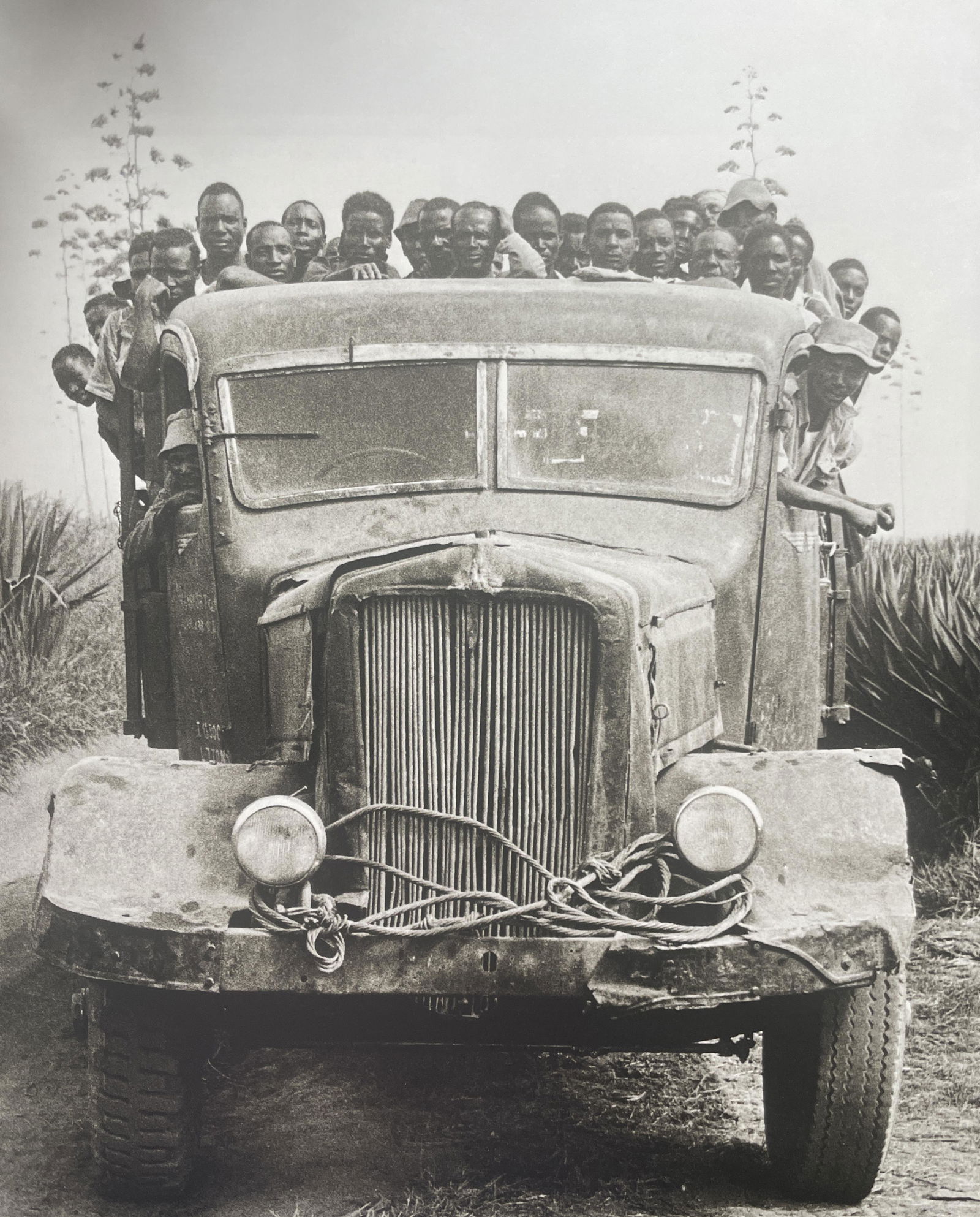 Peter Beard "Transport Truck, Africa" Print: Peter Beard "Transport Truck, Africa" Print. Measures 11.75 x 10.0. Mounted to Archival Quality Paper. Verso is blank.