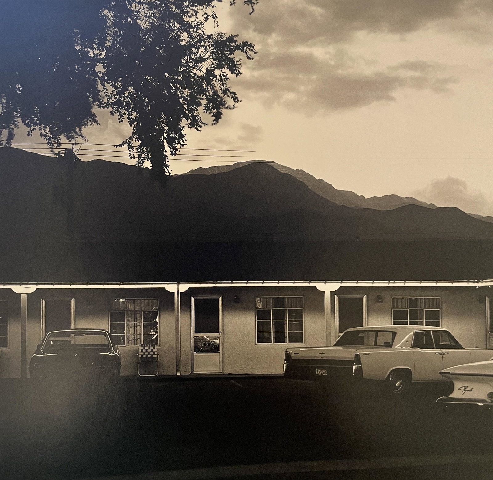 Robert Adams "Motel" Print: Robert Adams "Motel" Print. Measures 5.75 x 5.8. Mounted to Archival Quality Paper. Verso is blank. Printed circa 1970's.