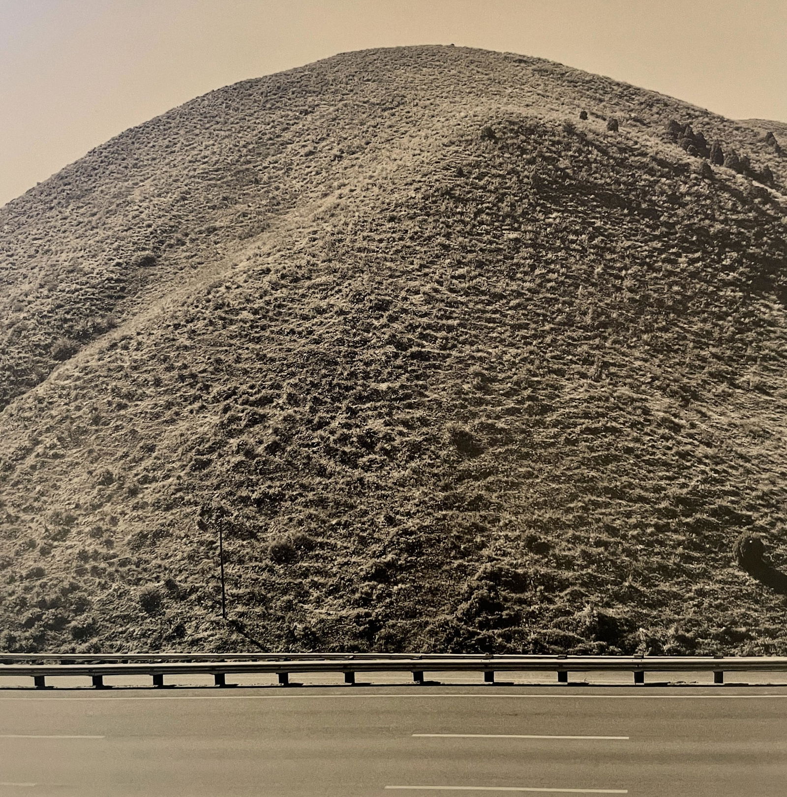 Robert Adams "Federal 40, Mount Vernon Canyon" Print: Robert Adams "Federal 40, Mount Vernon Canyon" Print. Measures 6 x 5.8. Mounted to Archival Quality Paper. Verso is blank. Printed circa 1970's.