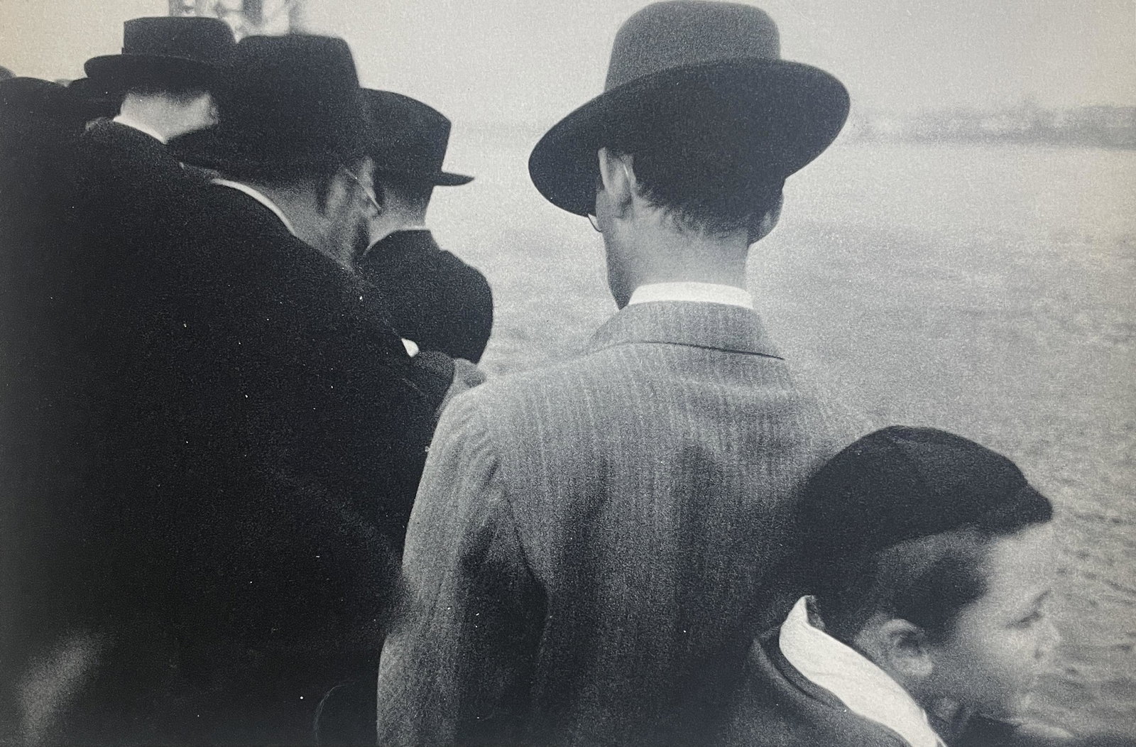 Robert Frank "Yom Kippur, East River, New York City" Print: Robert Frank (1924-2019) was a Swiss-American photographer and filmmaker who is widely regarded as one of the most important and influential photographers of the 20th century. He is best known for his