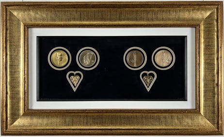 Erte (romain De Tirtoff) - A framed collection of four medallions and two pendants, all signed in