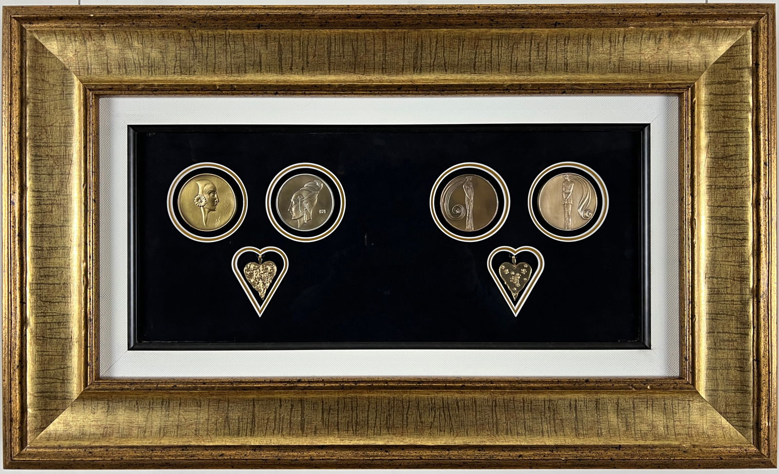Erte (romain De Tirtoff) - A framed collection of four medallions and two pendants, all signed in: Erte (romain De Tirtoff) - A framed collection of four medallions and two pendants, all signed in the casting by Erte. Each item was exclusive to Park West Gallery. The collection includes the followi