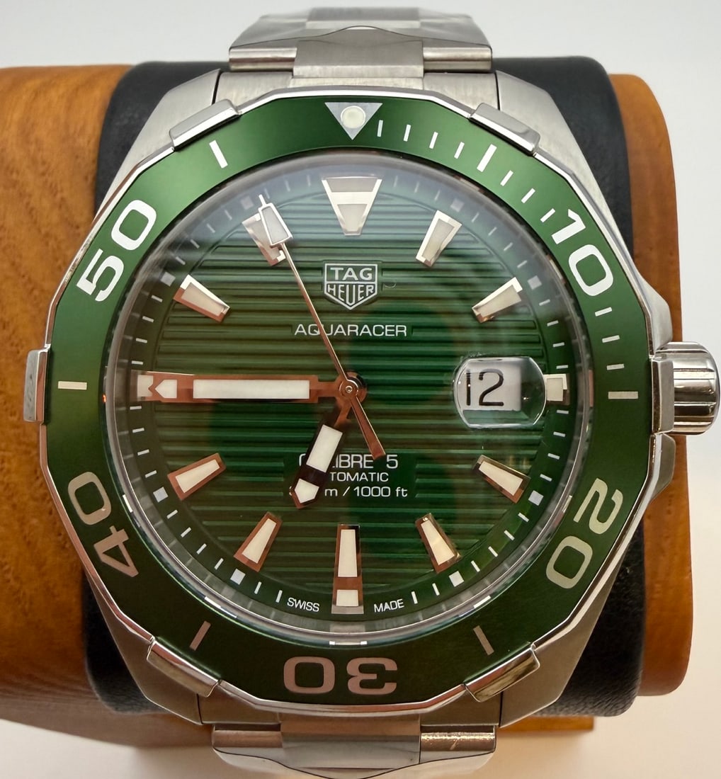 Tag Heuer "GREEN GOBLIN" Green Dial and Bezel Aquaracer Automatic Watch Model WAY201S.BA0927: Tag Heuer "GREEN GOBLIN" Green Dial and Bezel Aquaracer Automatic Watch Model WAY201S.BA0927. Stainless steel case with a stainless steel bracelet. Uni-directional rotating stainless steel bezel with 