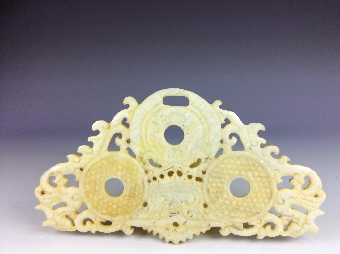 Large jade carved disc in shape of round discs and (1 of 3)