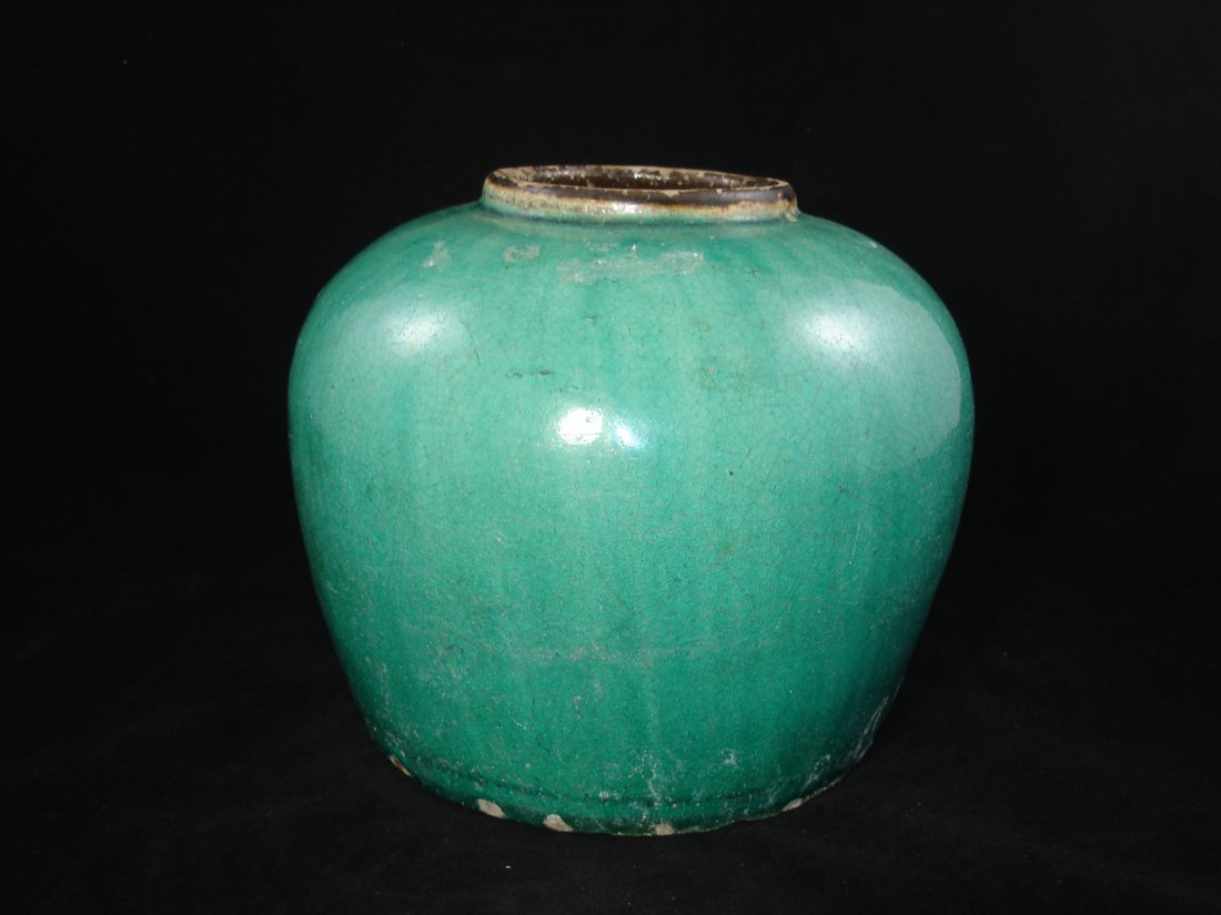 Rare Chinese Green Glaze Round Pot: Rare Chinese green glaze round pot, possible Ming dynasty or later. Size: 8" Ht. 9" W. Condition: Glaze flaw otherwise in good condition. (Refer to pictures.) Shipping: We provide in house packing and