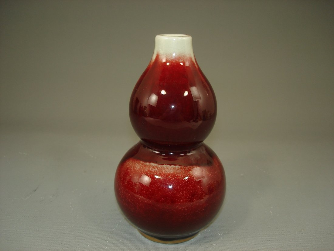 Chinese Lang-Yao /Ox Blood Red Double Bulbous Bottle: Chinese Lang-Yao red/ox blood red glaze double bulbous/ calabash bottle vase. Size: 6" Ht. 3.25" W. Condition: Good condition. (Refer to pictures.) Shipping: We provide in house packing and shipping s