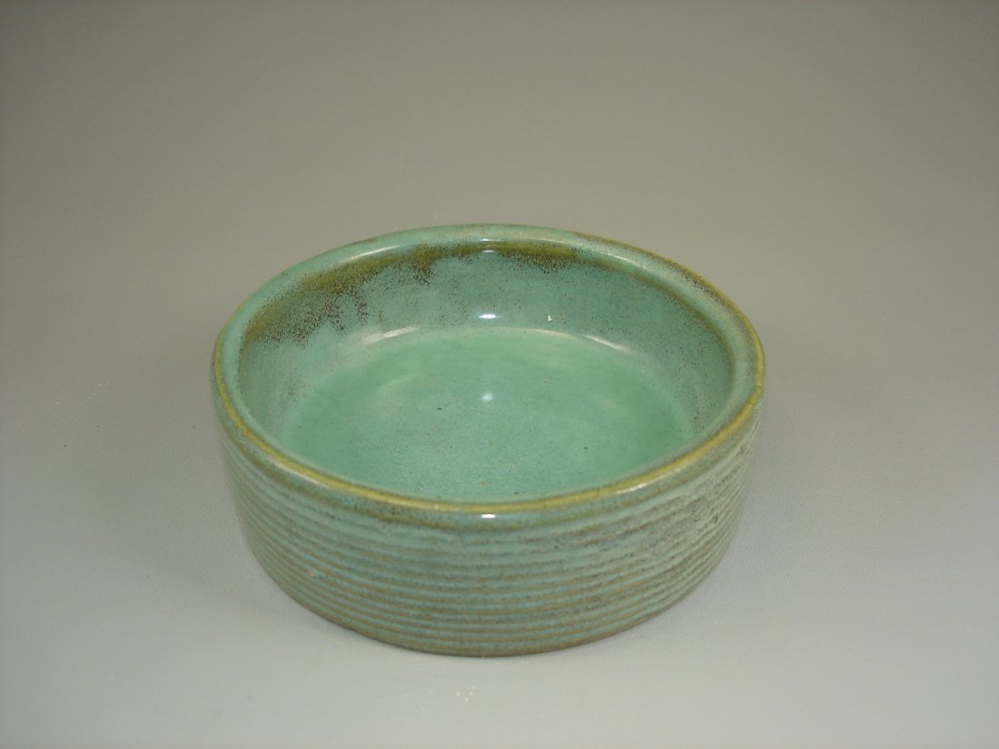 Chinese Green glazed Pot: Chinese Green glazed Pot. Size: 5 1/2" D. Condition: Goos condition. (Refer to pictues) Shipping: We provide in house packing and shipping services at buyer's expense. The estimated shipping cost (exc