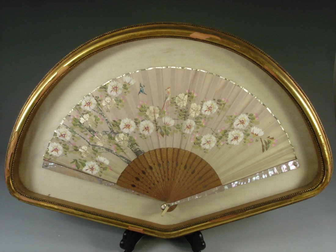 Vintage shadow box hand fan: Vintage shadow box hand fan, hand painted with embroidery, Mother-of-pearl and wood framed. Size: 22" x 14.5" Condition: Slight scratch on edge of frame, otherwise in good condition. (Refer to picture