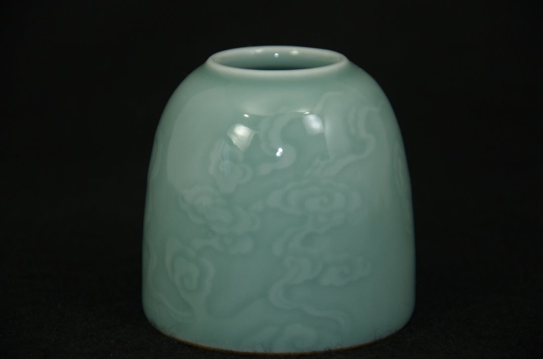 Chinese celadon bell-shaped pot with engraving of: Chinese celadon bell-shaped pot/washer, with engraving of clouds, six-character mark on base. Size: 3" Ht. 3" W. Condition: Good condition, refers to pictures. Shipping: We provide in house packing an