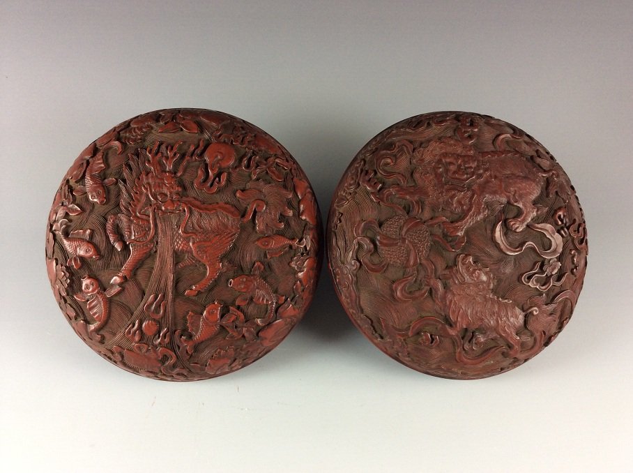 Fine Chinese Carved Cinnabar Round Box with Auspicious: 朱砂瑞兽圆盒 Fine Chinese Carved Cinnabar Round Box with Auspicious Animals Design Size: 7" Diameter. Condition: Age cracks inside the box otherwise in good conditi