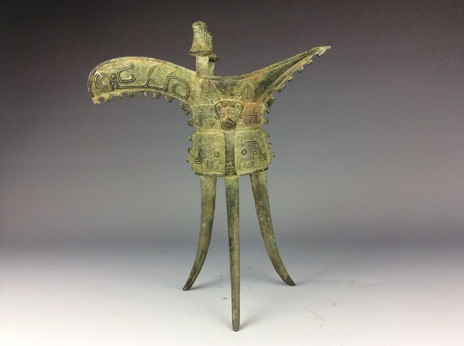 Chinese bronze tripod goblet, carved with clouds and (1 of 6)