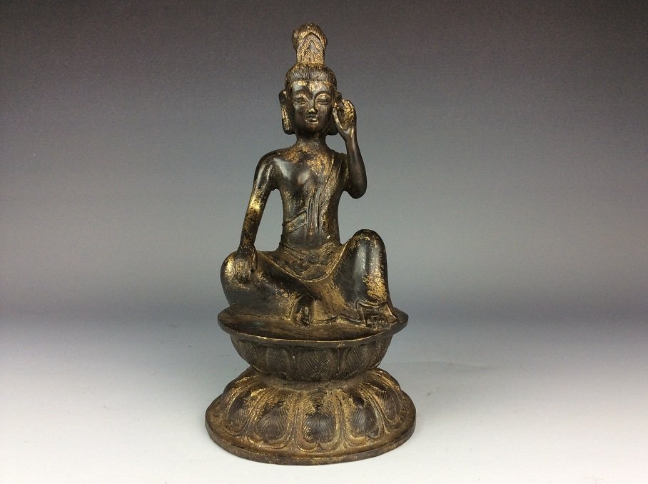 Chinese bronze statue of seated buddha on lotus seat. (1 of 4)