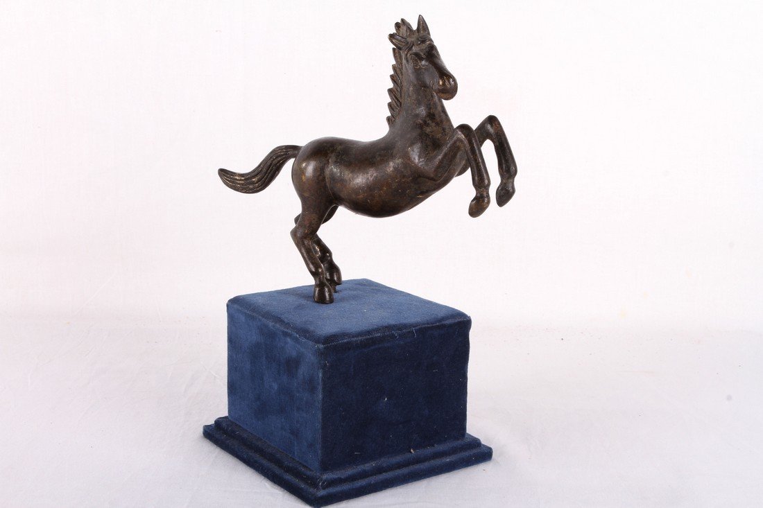 [CHINESE]A LATE 16TH CENTURY GILT BRONZE FIGURE OF A (1 of 2)