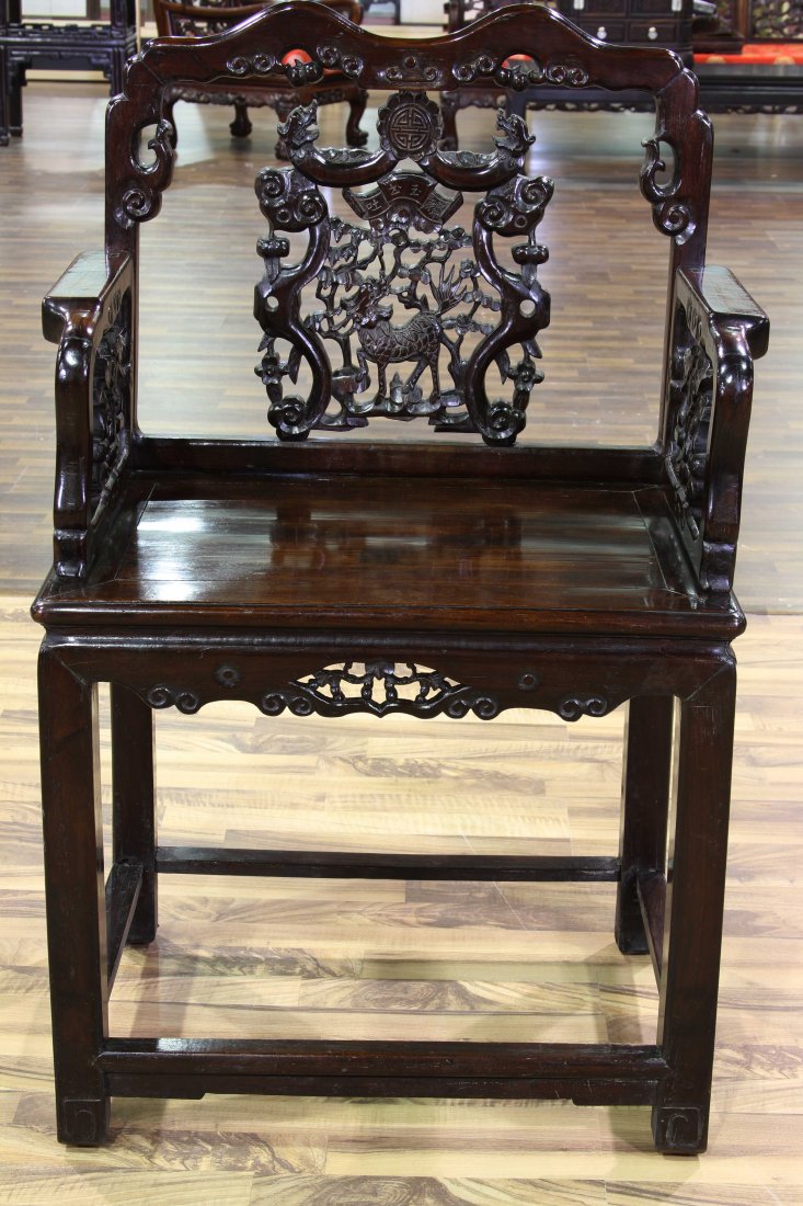 [CHINESE]A EARLY 20TH CENTURY SUANZHI WOOD CHAIR WITH: [CHINESE]A EARLY 20TH CENTURY SUANZHI WOOD CHAIR WITH DRAGON L:24" W:18.25"H:39"二十世纪早期酸枝木雕龙镂空单椅