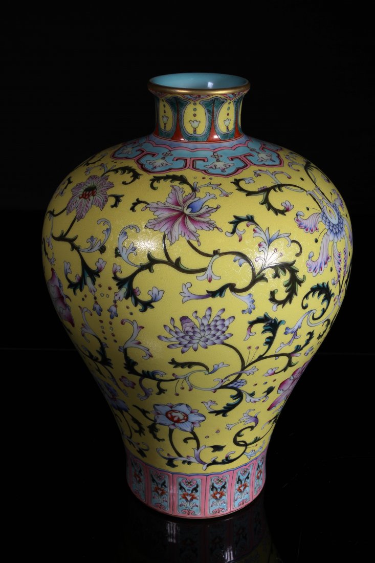 [CHINESE]A "DA QING QIAN LONG NIAN ZHI"MARKED FAMILLE: [CHINESE]A "DA QING QIAN LONG NIAN ZHI"MARKED FAMILLE ROSE PORCELAIN MEI VASE PAINTED WITH FLOWERS W:7.3" H:13.6"大清乾隆年制款黄地轧道