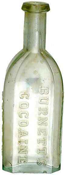 Burnetts Cocoaine Glass Bottle: Original "Burnett's Cocoaine" Glass Bottle, Very Fine. c. 1860, 6" high, light clear green glass. According to Fred Reed, Burnett's Cocoaine had "...nothing to do with the cocaine, the drug. Burnett's