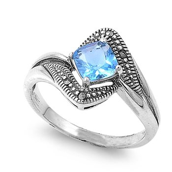 Sterling Silver Marcasite Ring: Face Height: 13 mm Band Width: 2 mm Stone: Aquamarine Finished: Rhodium Plated