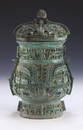 A CHINESE ARCHAIC BRONZE RITURAL VESSEL YOU