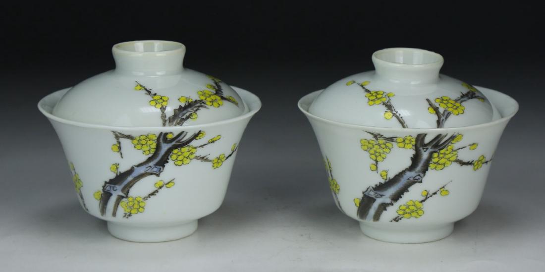 PAIR CHINESE ANTIQUE FAMILLE ROSE PORCELAIN LIDDED: Pair Chinese Antique Famille Rose Porcelain Lidded Bowls: Each Finely Potted And Of Rising Sides, Exteriors Painted With Blossoming Branches And Yellow Flowers; Size: D: 4-1/4" (10.8cm) [Each]