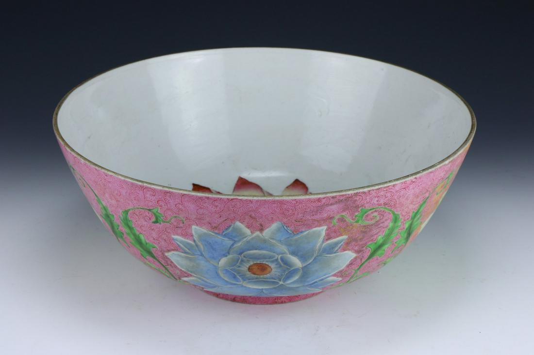 A BIG CHINESE FAMILLE ROSE PORCELAIN BOWL: A Big Chinese Famille Rose Porcelain Bowl: Well Potted And Of Deep Rounded Sides, Painted To The interior With A Blooming Lotus Blossom, Exterior Painted With Additional Lotus Flowers Of Mixed Tones, 