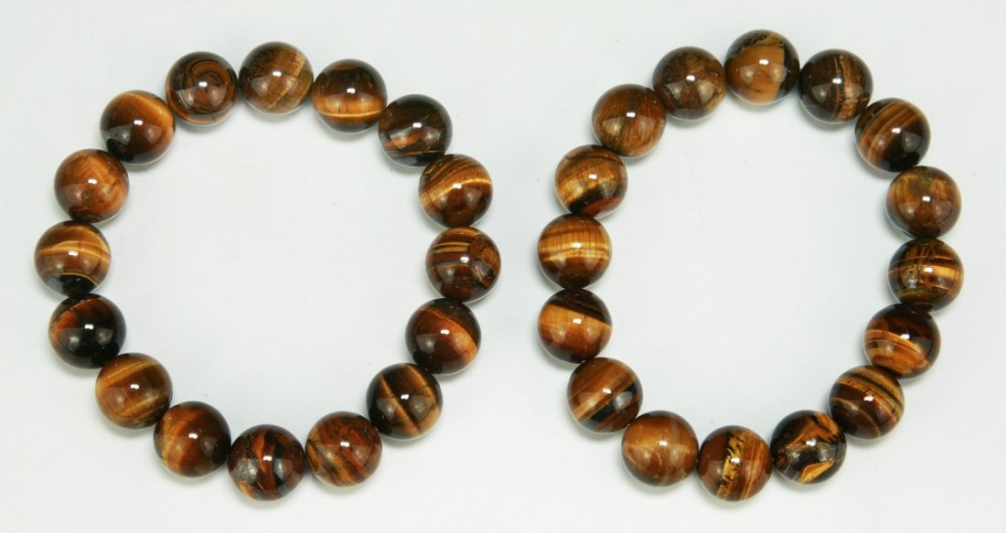 Pair Tiger Eye Bead Bracelets: Pair Tiger Eye Bead Bracelets; Dimension: D: 77mm; (bead) D: 12.5mm