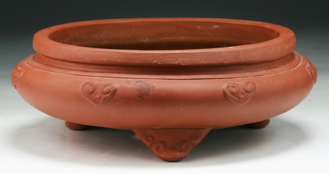 A Chinese Yixing Zisha Pot: A Chinese Yixing Zisha Pot; Dimension: D: 9"
