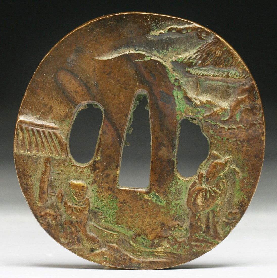 A Japanese Antique Bronze Tsuba: A Japanese Antique Bronze Tsuba; Dimension: D: 2-3/4"