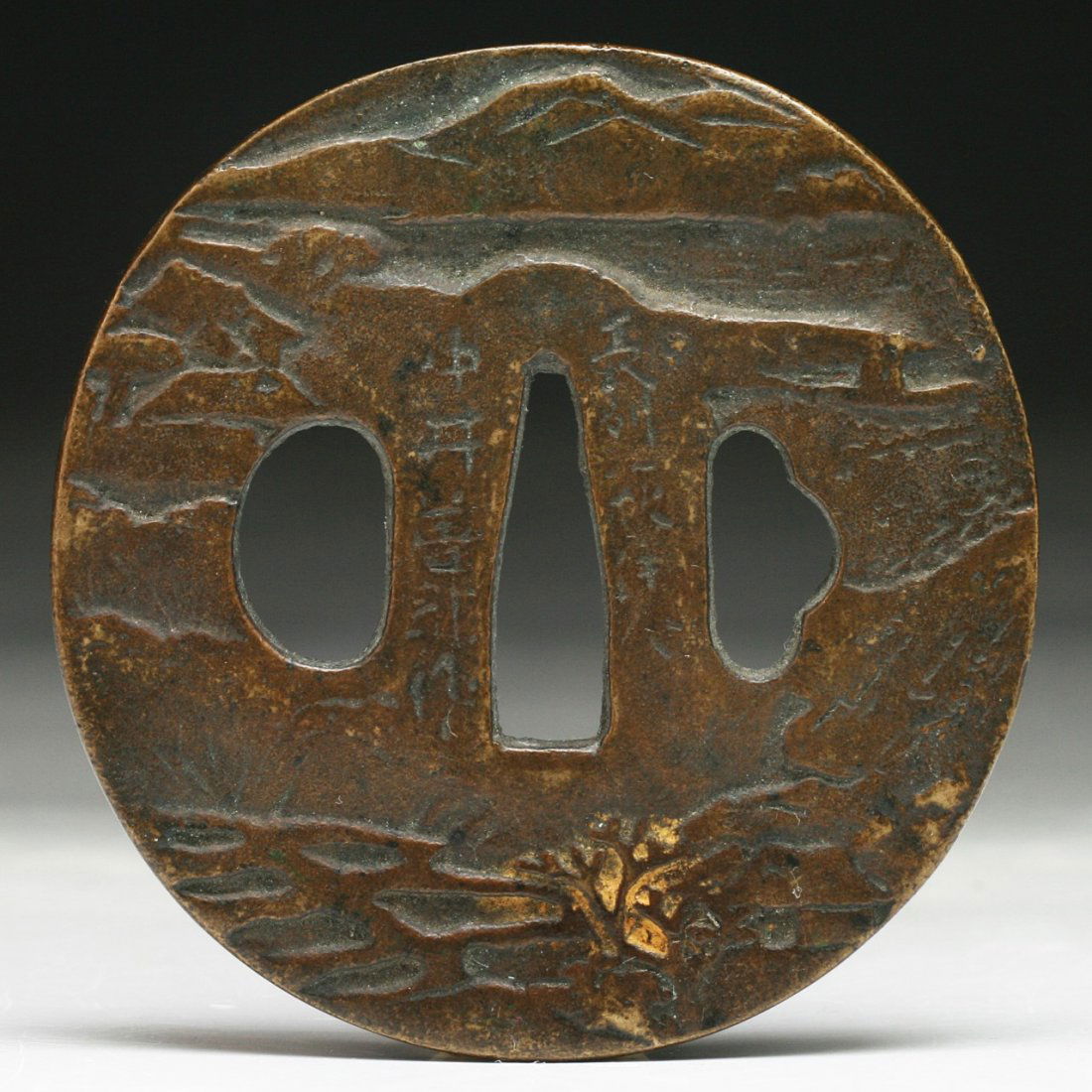 A Japanese Antique Bronze Tsuba: A Japanese Antique Bronze Tsuba; Dimension: D: 2-3/4"
