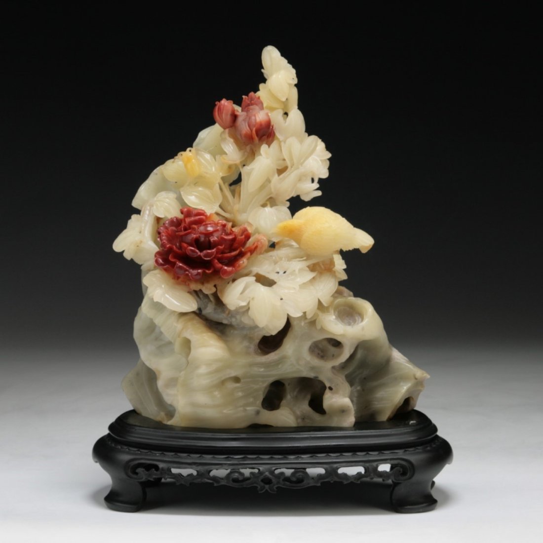 A Chinese Carved Shoushan Soapstone Group: A Chinese Carved Shoushan Soapstone Group: presented on a wood stand; Dimension: H: 10-1/8"