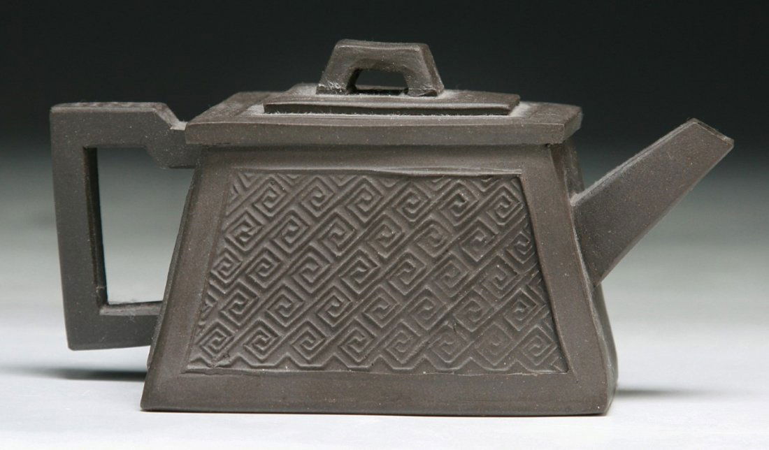 A Chinese Antique Zisha Teapot: A Chinese Antique Zisha Teapot; Size: H: 2-3/4"; L: 5-1/4"