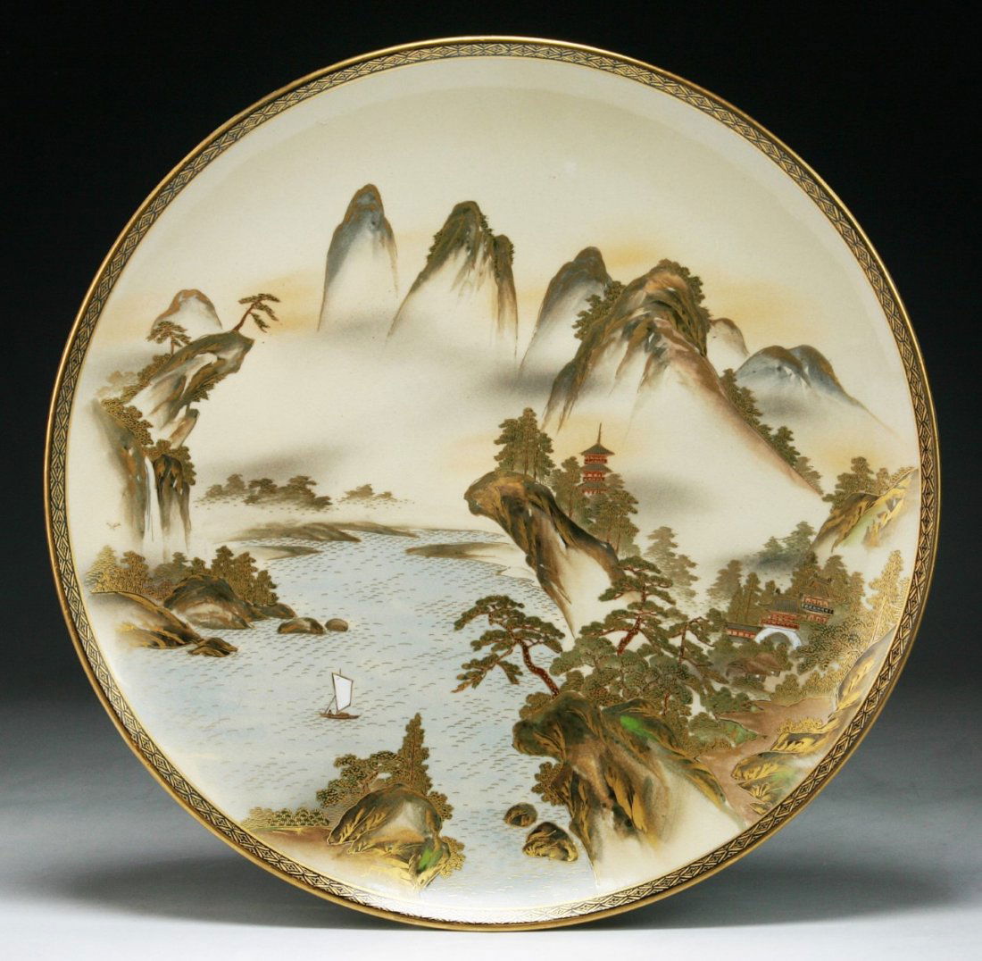 A Japanese Antique Gilt Satsuma Porcelain Plate: A Japanese Antique Gilt Satsuma Porcelain Plate: signed on the base; Size: D: 12-1/4"