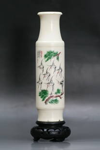 A Chinese Antique Polychrome Ivory Vase: A Chinese Antique Polychrome Ivory Vase: presented on wood stand; Size: H: 9"