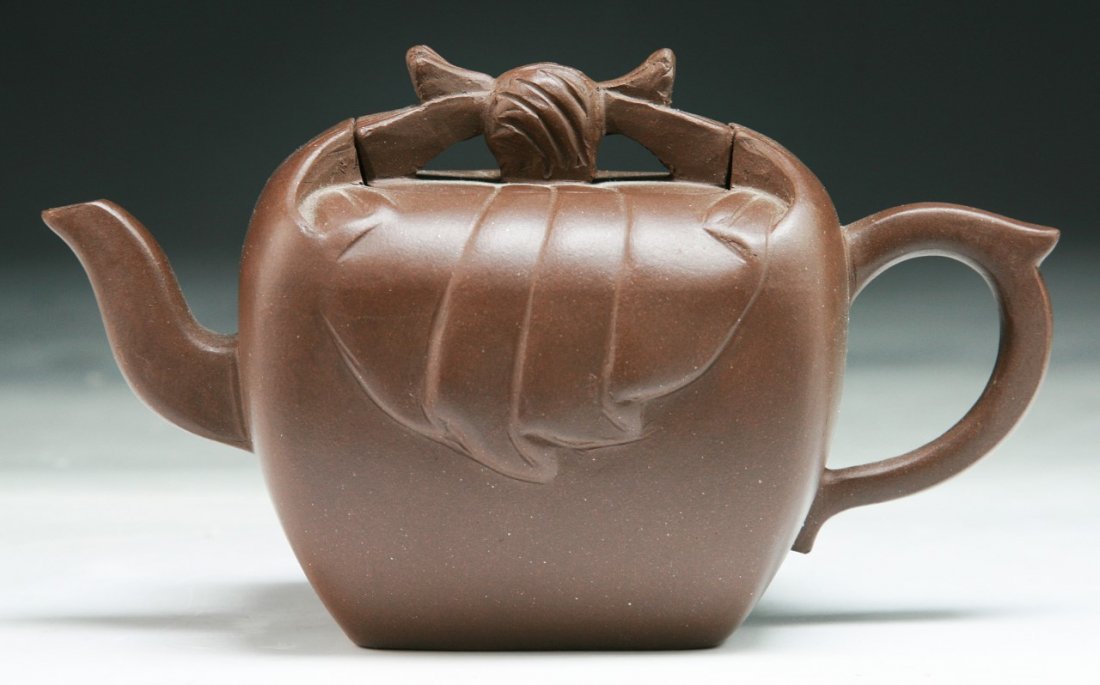 A Chinese Antique Zisha Teapot: A Chinese Antique Zisha Teapot; Size: L: 5-3/4"