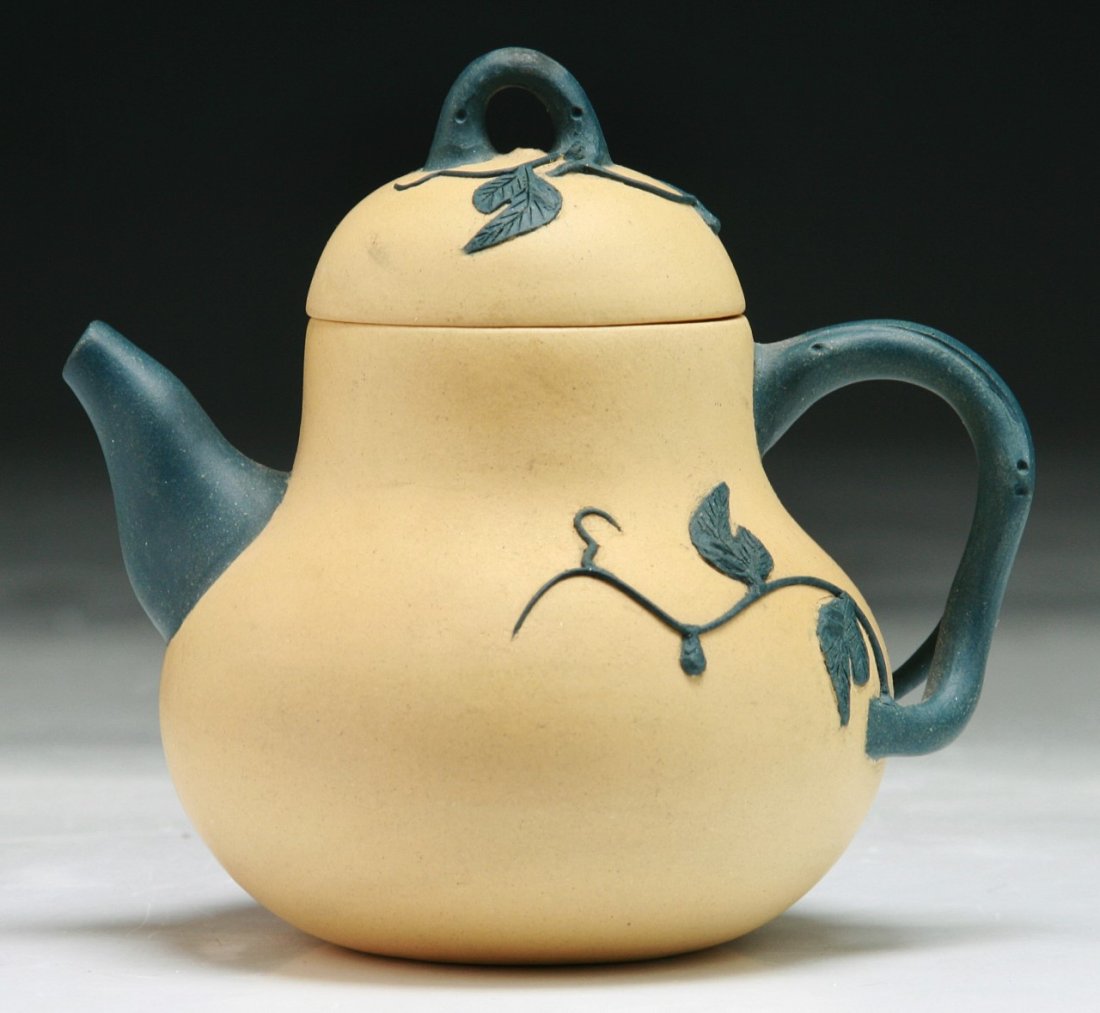 A Chinese Antique Zisha Teapot: A Chinese Antique Zisha Teapot; Size: L: 4-1/4"
