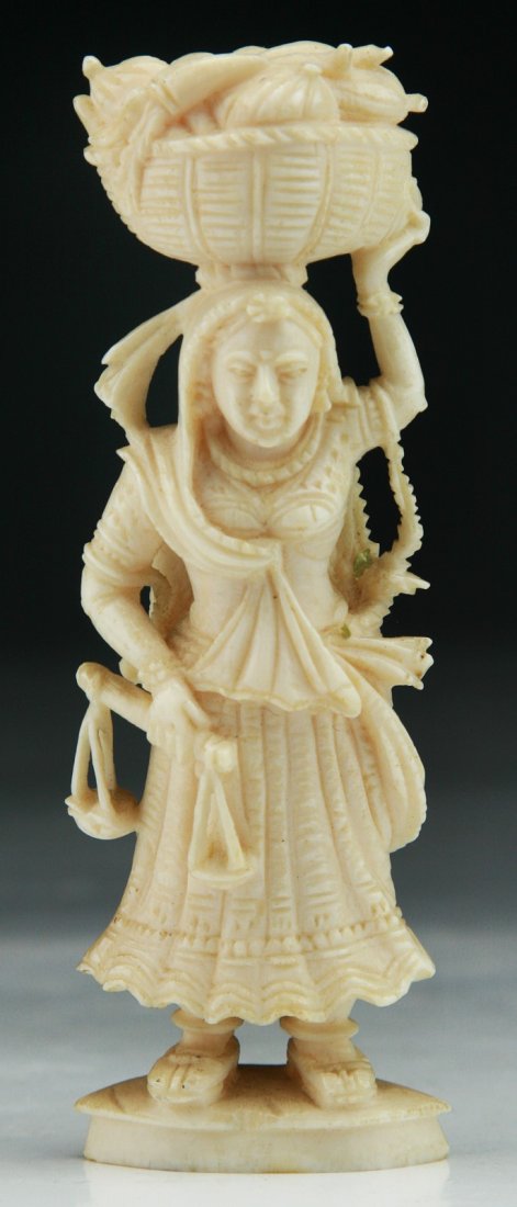An Indian Antique Carved Ivory Figure: An Indian Antique Carved Ivory Figure; Size: H: 3-3/4"