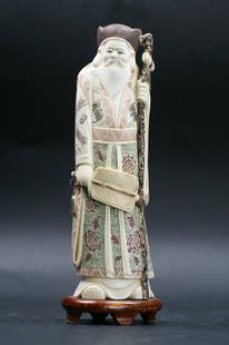 A Japanese Polychrome Ivory Okimono: Figure: A Japanese Polychrome Ivory Okimono: Figure; Size: H: 10-3/4"