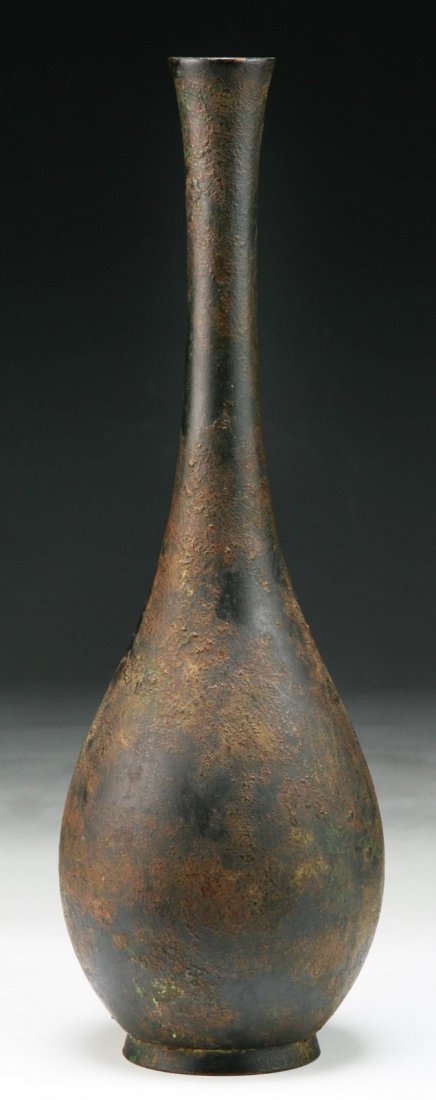 A Japanese Antique Bronze Vase: A Japanese Antique Bronze Vase: of oval shape with slender neck, Circa 1900; Size: H: 10-1/4"