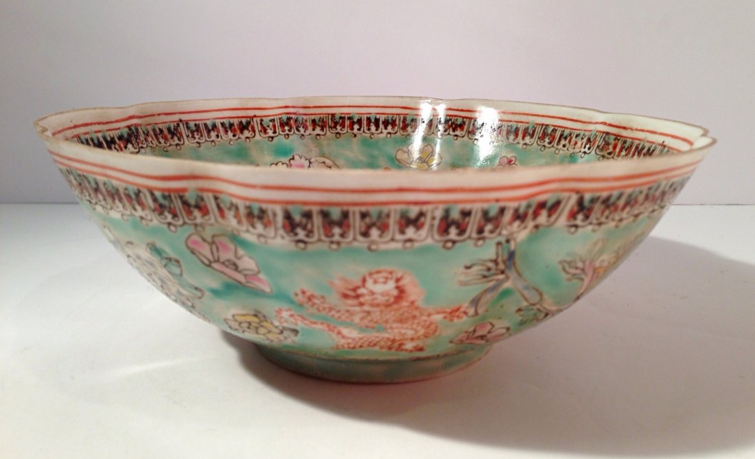 Eggshell porcelain bowl with dragon: Measurements: Diameter: 7". H: 2 1/2".