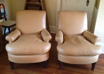 Vintage Club Chairs: Designer: Hagins Mortimer Pair of vintage tight back club chairs recently reupholstered in camel colored leather with exposed mahogany legs. Seat cushion is down and feathers. Excellent condition. 29"