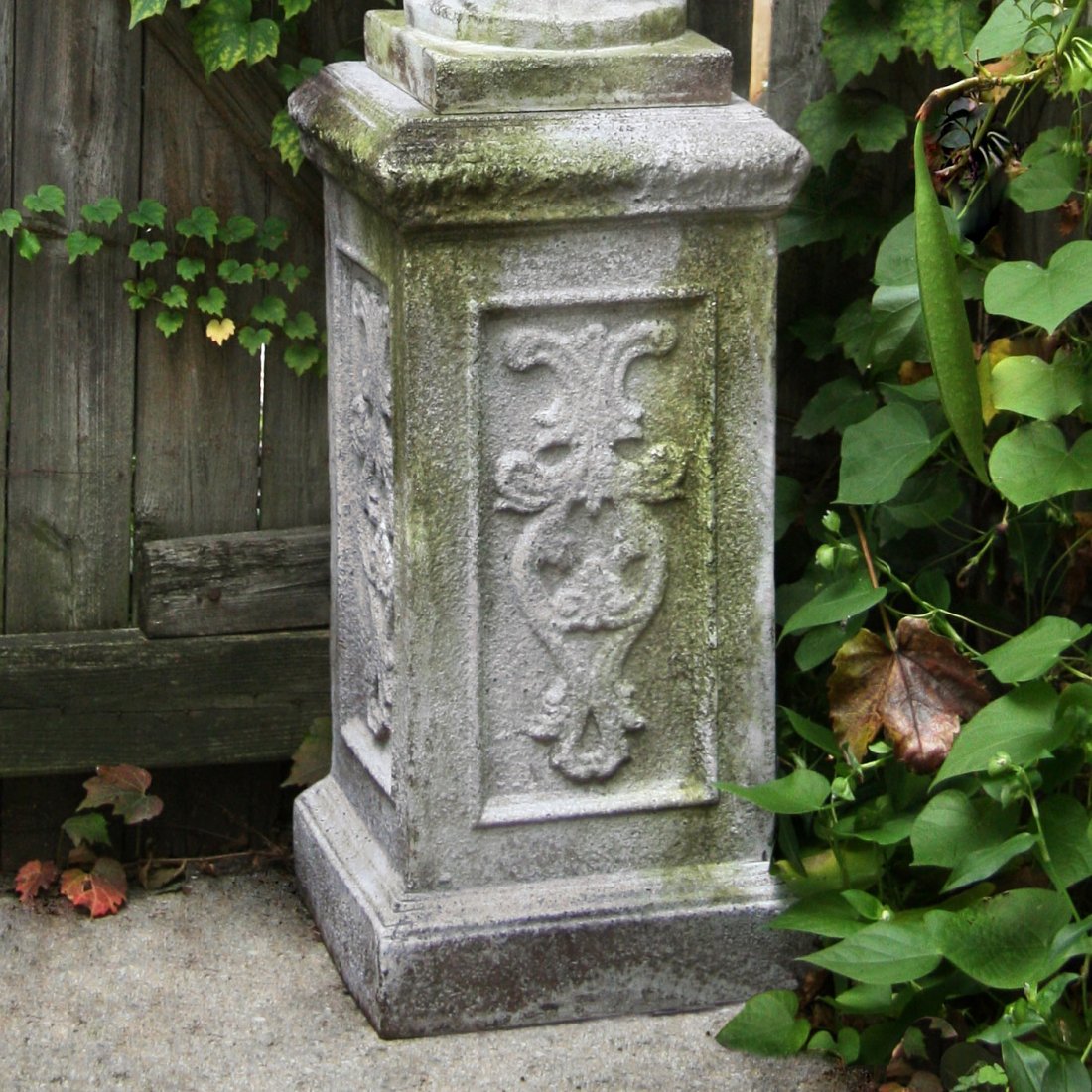 Liberick Outdoor Pedestal: Designer: Ken Gemes Cast of durable fiber stone, a mixture of sand, stones, and fiberglass that is lighter and less fragile than concrete. 12" sq. x 23"H, 14 lbs.