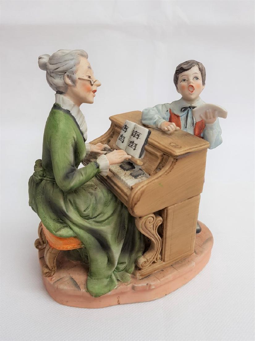 ANTIQUE PORCELAIN FIGURE " PIANO TEACHER " (1 of 3)