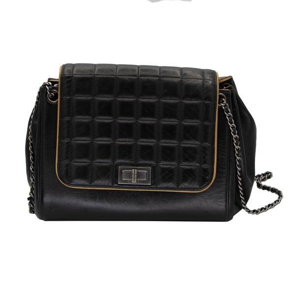 Vintage Leather Chanel Shoulder Bag: Beautiful vintage Chanel shoulder bag with one main pouch and a small side zippered pocket. Stainless steel hardware with a stainless steel and leather strap which can be doubled up and worn as a hand