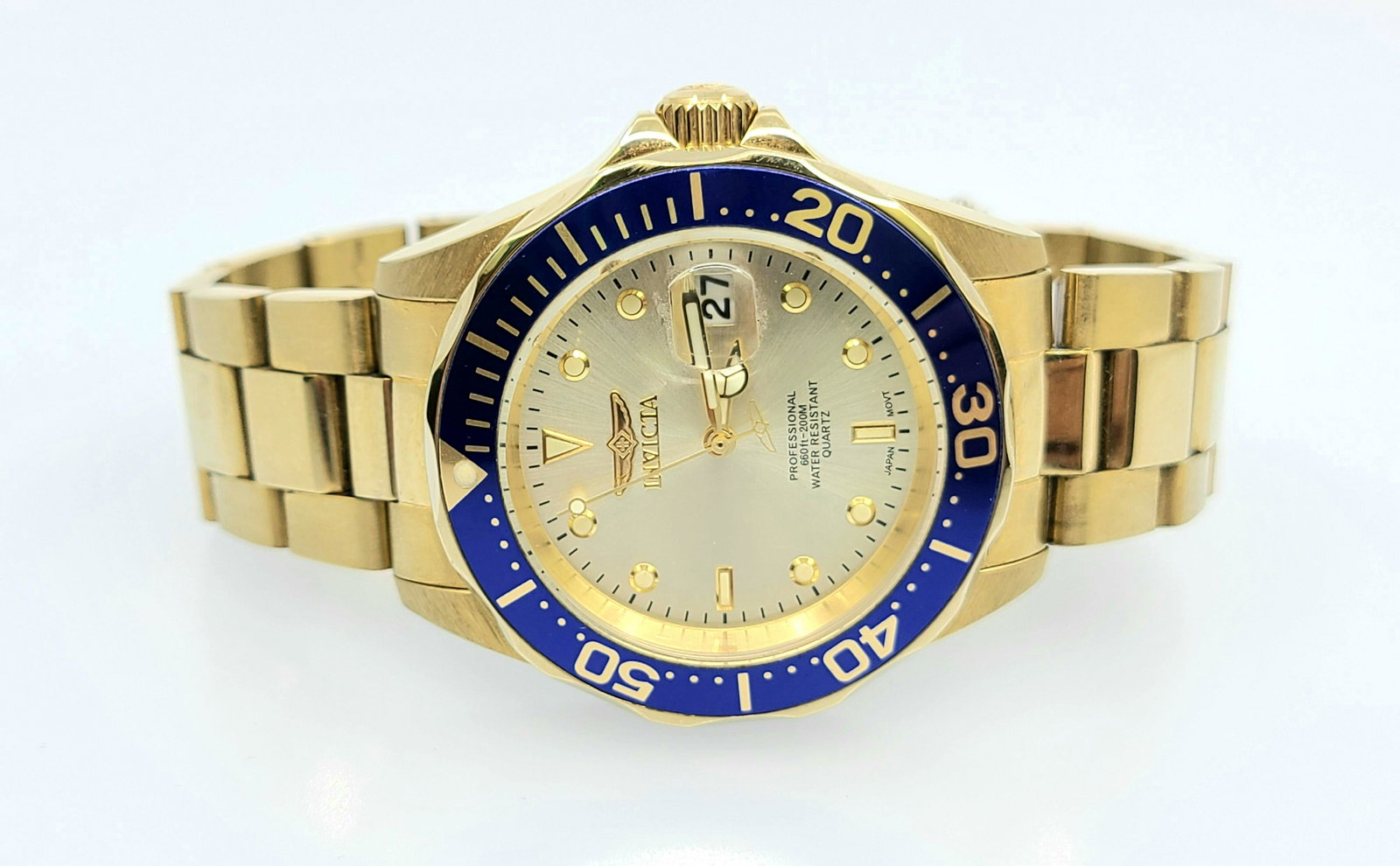 Invicta gold plated men's sport watch: model 14124 divers watch