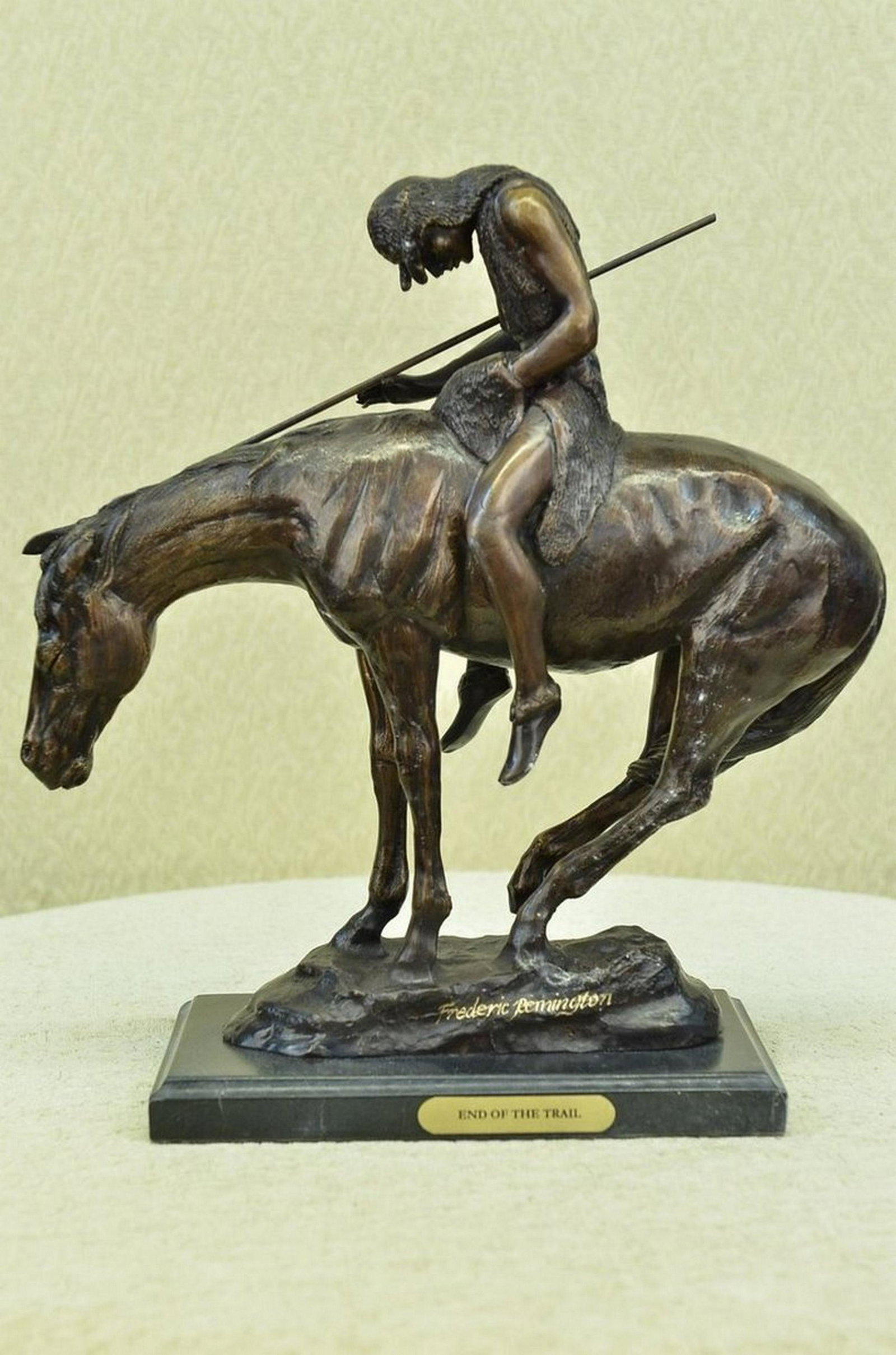 FREDERIC REMINGTON "END OF TRAIL" BRONZE SCULPTURE: Total Dimensions: Height 16'' x Width 15''Approximate Weight: 17 LBSOriginal Reproduction: Reproduction